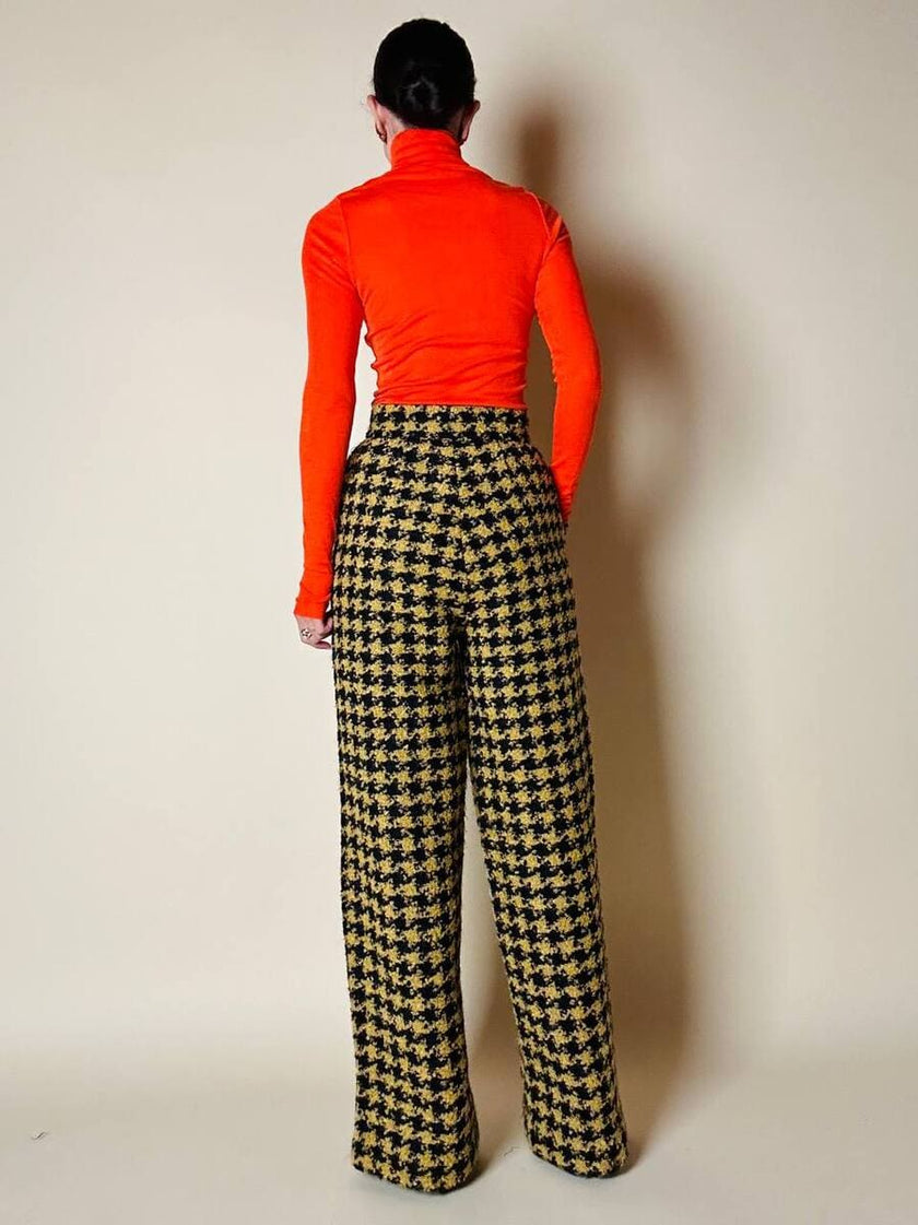 Pantalone a palazzo giallo e nero in lana bouclé fantasia pied de coque “Weili Zheng”