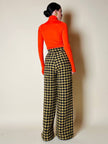 Pantalone a palazzo giallo e nero in lana bouclé fantasia pied de coque “Weili Zheng”