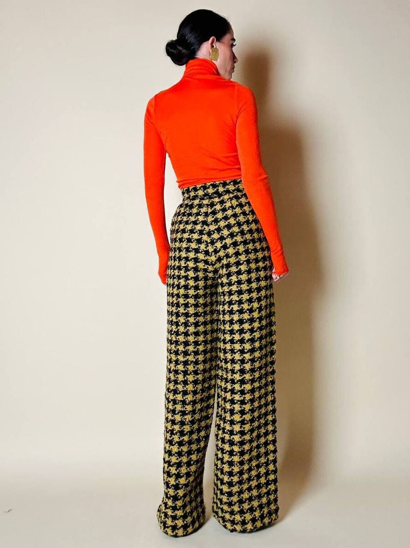 Pantalone a palazzo giallo e nero in lana bouclé fantasia pied de coque “Weili Zheng”