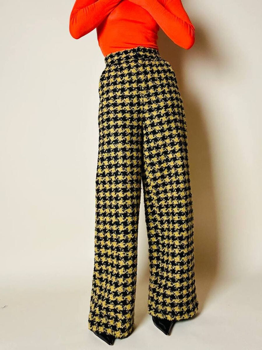 Pantalone a palazzo giallo e nero in lana bouclé fantasia pied de coque “Weili Zheng”