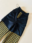 Pantalone a palazzo giallo e nero in lana bouclé fantasia pied de coque “Weili Zheng”