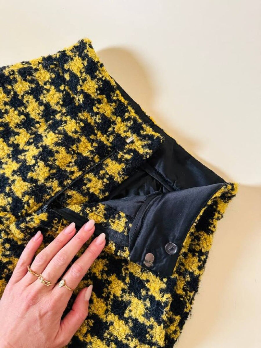 Pantalone a palazzo giallo e nero in lana bouclé fantasia pied de coque “Weili Zheng”