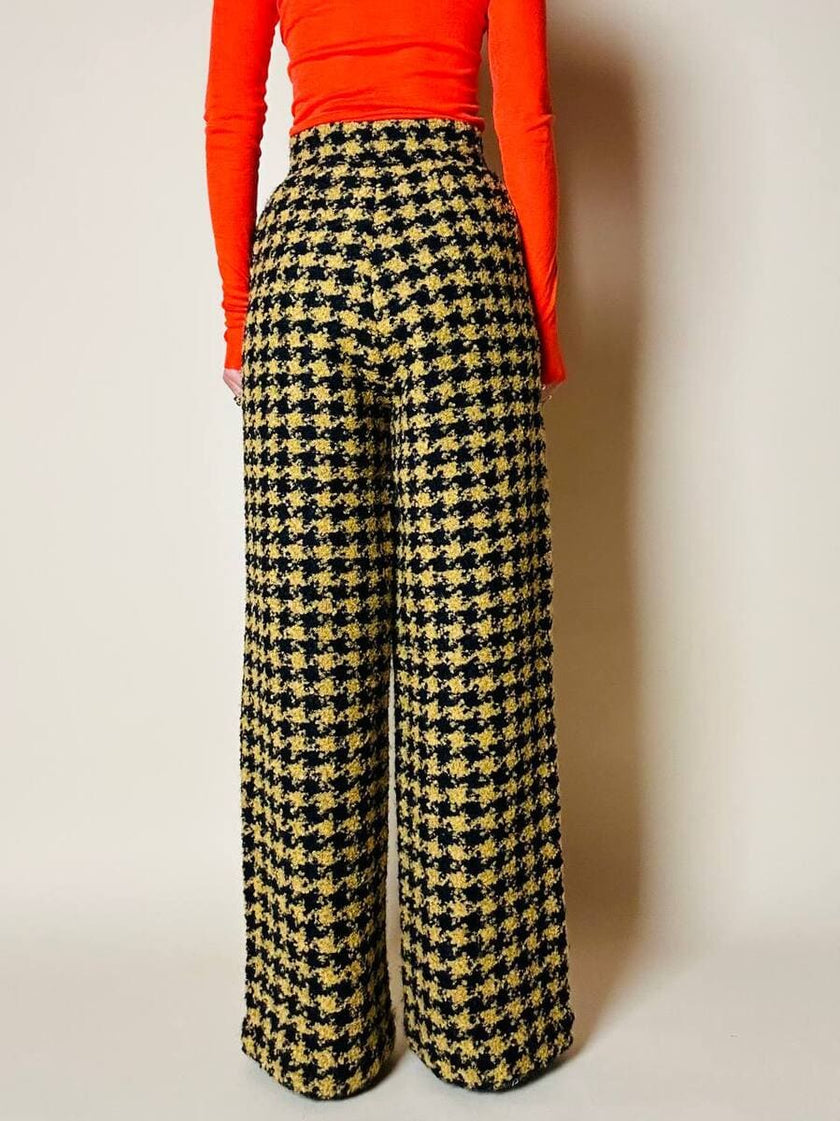 Pantalone a palazzo giallo e nero in lana bouclé fantasia pied de coque “Weili Zheng”