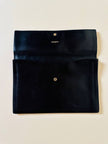 Pochette vintage Yves Saint Laurent in pelle nera con greca logata in rilievo