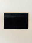 Pochette vintage Yves Saint Laurent in pelle nera con greca logata in rilievo