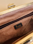 Pochette in whips a righe beige e nere con tracolla in catena oro 