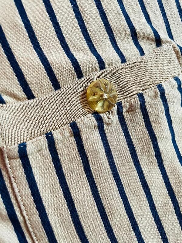 Polo a righe con bottoni gioiello