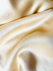 Slip dress in seta champagne by Malizia