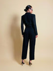 Smoking jumpsuit nera con bottoni dorati