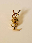 Spilla logo “Yves Saint Laurent”
