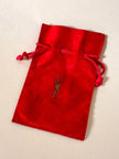 Spilla logo “Yves Saint Laurent”