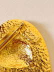 Goldfarbene herzförmige Brosche 
