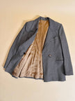 Tailleur sartoriale in lana boutonné