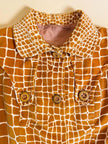 Trench sartoriale in velluto stampato fantasia giraffa