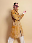 Trench sartoriale in velluto stampato fantasia giraffa