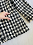Blazer a scacchi bianchi e neri Yves Saint Laurent