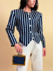 Iconico blazer gessato Yves Saint Laurent