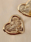 Maxi clip dorate a forma di cuore “Moschino”
