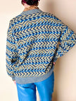Cardigan Missoni Sport con pattern geometrico e trama tridimensionale nei toni del verde e blu