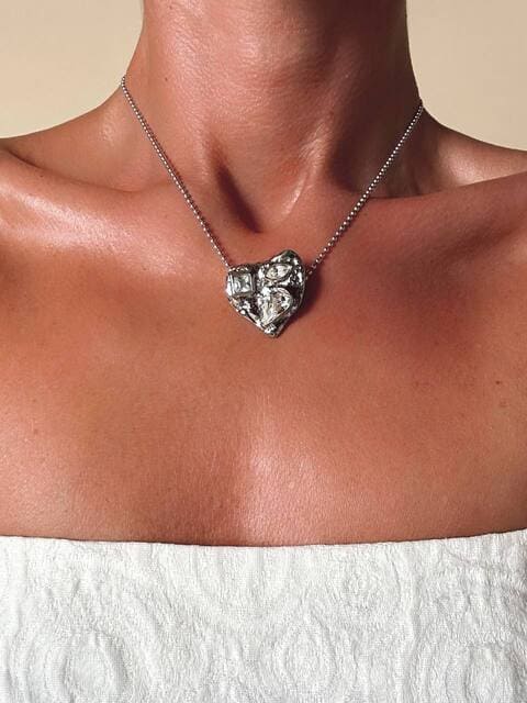 Collier argento con ciondolo a forma di cuore e cristalli incastonati “Yves Saint Laurent”