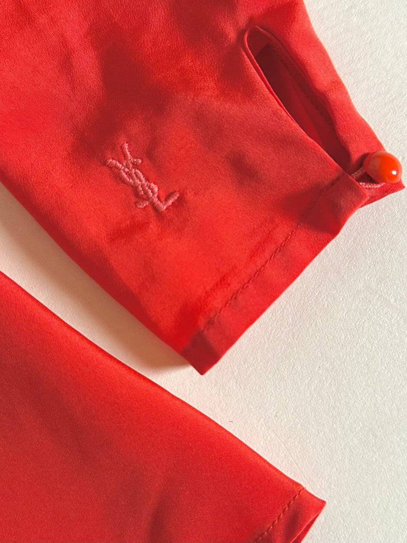 Blusa rossa con scollo drappeggiato “Yves Saint Laurent”