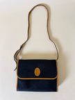 Borsa messenger in pelle nera stampata con profili cuoio “Yves Saint Laurent”
