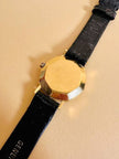 Orologio con quadrante esagonale e cinturino in coccodrillo nero 