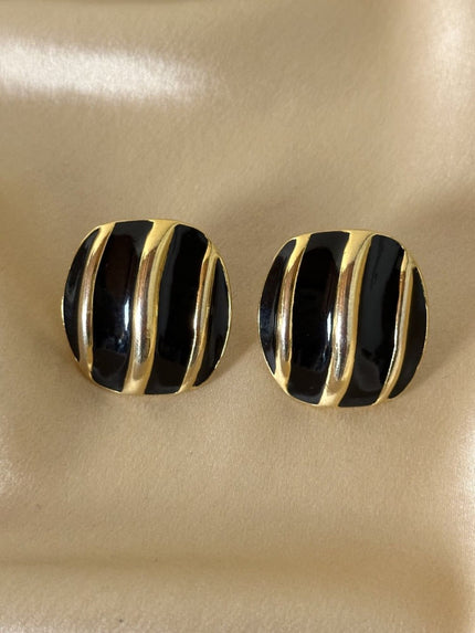 Clip in metallo dotato con dettagli in smalto nero