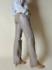 Pantalón de tiro alto de piel color crema “Grandinetti”
