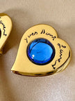 Orecchini a clip Yves Saint Laurent a forma di cuore con cabochon celesti