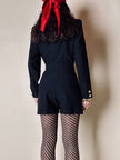 Mini Jumpsuit nera in rasato di lana con bottoni gioiello e cintura in coordinato