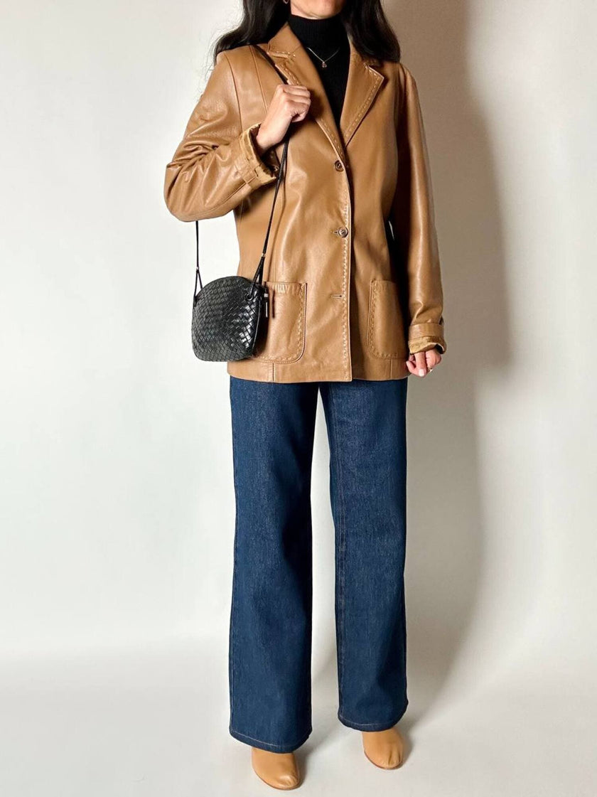 Vintage tan leather jacket with hand-stitched detailing by Claude Collections