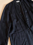 Blazer oversize in seta nera “Années Lauder”