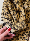 “Yves Saint Laurent” faux fur leopard print parka