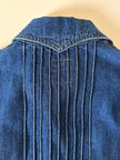 Giacca Christian Lacroix in denim modello sciancrato con lavorazione a nervature