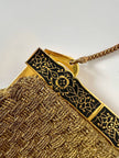 Borsa vintage Art Déco in lamé oro intrecciato con chiusura gioiello e nappa couture