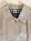 Vintage Burberry’s beige quill gabardine trench coat with matching belt and Check lining