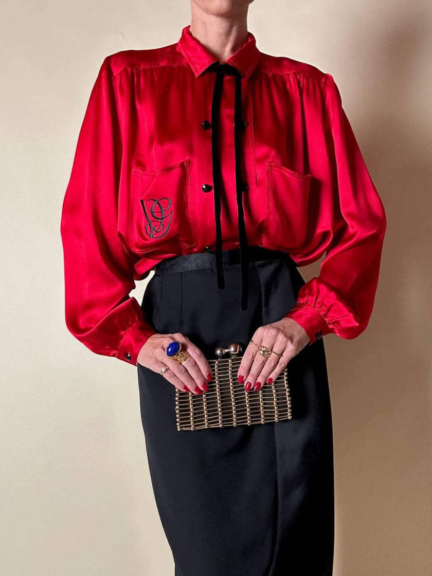 Clutch gioiello in seta nera con armatura di perline dorate “Rodo”