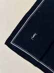 Foulard in seta nera con profili e logo bianchi  “Yves Saint Laurent”