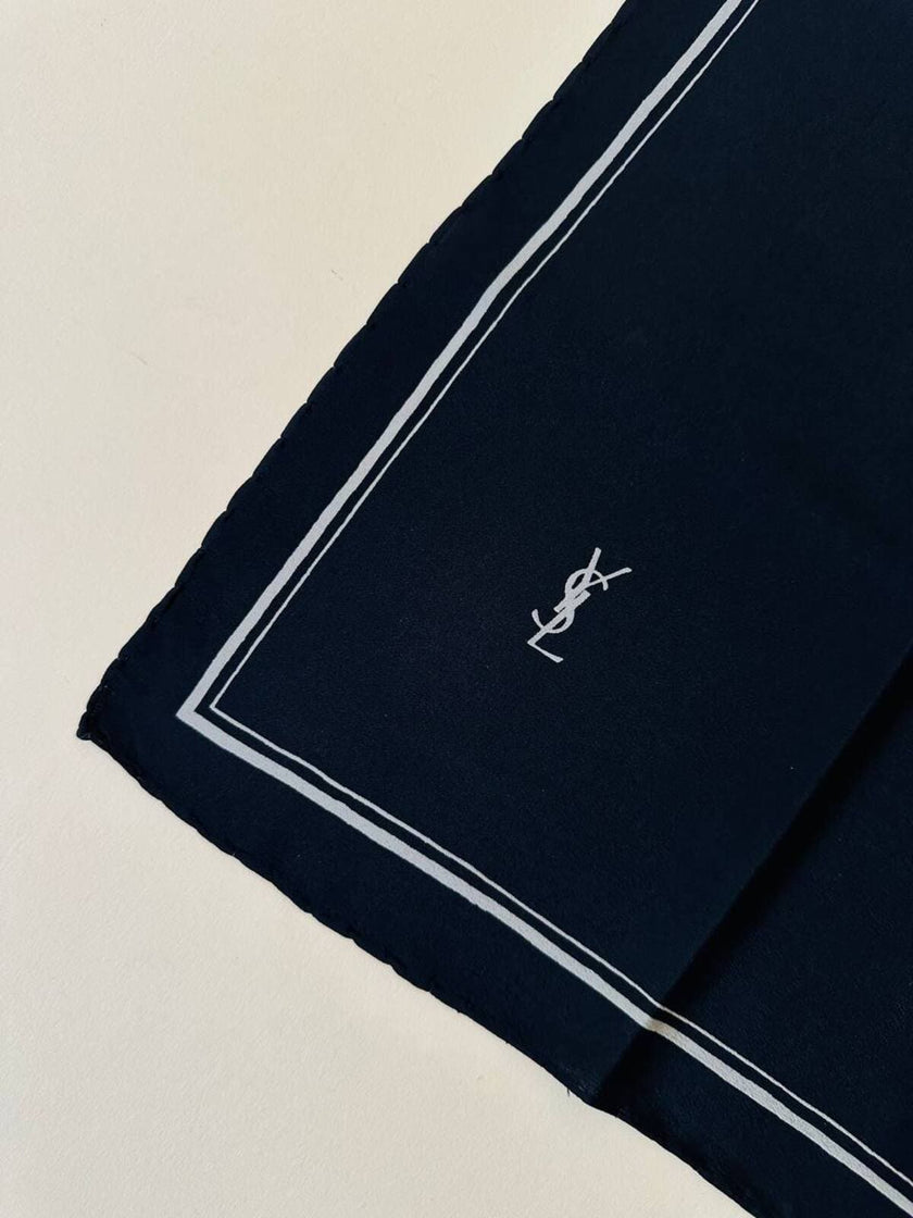 Foulard in seta nera con profili e logo bianchi  “Yves Saint Laurent”