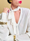 Camicia in seta bianca con strass ricamati 