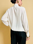 Camicia in seta bianca con strass ricamati 