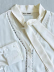 Camicia in seta bianca con strass ricamati 