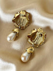 Clip dorate a forma di fiore con perle pendenti “Yves Saint Laurent”