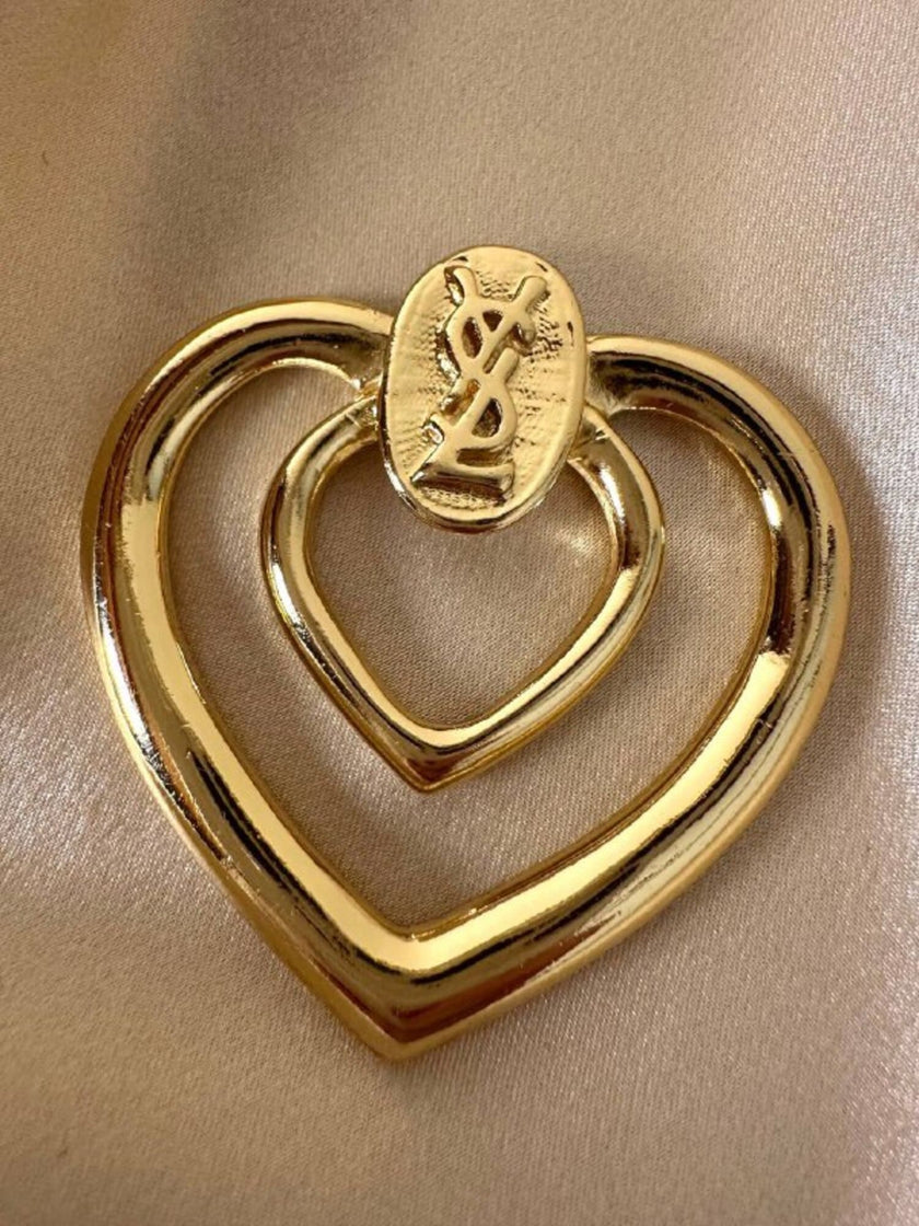Ferma foulard dorato a forma di cuore “Yves Saint Laurent”
