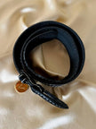 Cintura traforata in nabuk nero e bianco “Yves Saint Laurent”
