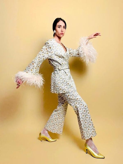 Lace tailleur con piume di marabù