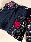 Giacchina corta con maniche a palloncino fantasia rose e pois “Genny”