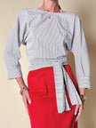 Blusa incrociata in cotone bianco a righe azzurre “P.A.R.O.S.H.”