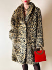 Eco pelliccia leopardata con maxi bottoni neri